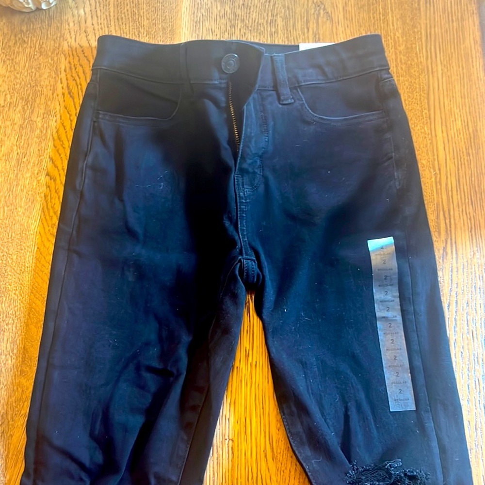 Black American eagle distressed ankle length jeans